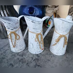 Three distressed look farmhouse pitchers w/foam insides